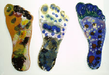 decorative tiles for a garden mural using hands and feet tiles