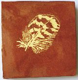 Delicate feather tile with yellow honey glaze