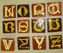 Lombardic letter tiles from the West Midlands