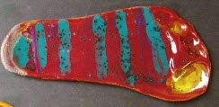 Fishy foot tile in bright striped coloured glazes