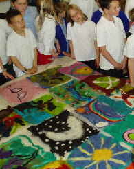 Isaac Newton Alphabet in felt from apple to zero made by two local schools