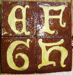 Medieval letter tiles were laid around the edge of a tiled floor