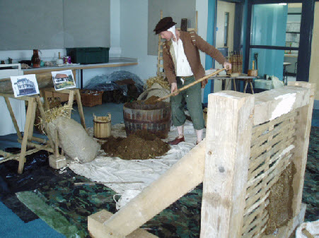 Oak lathes covered with mud and straw daub make a tudor building panel