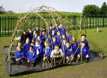 Living willow outdoor classroom with the class that built it